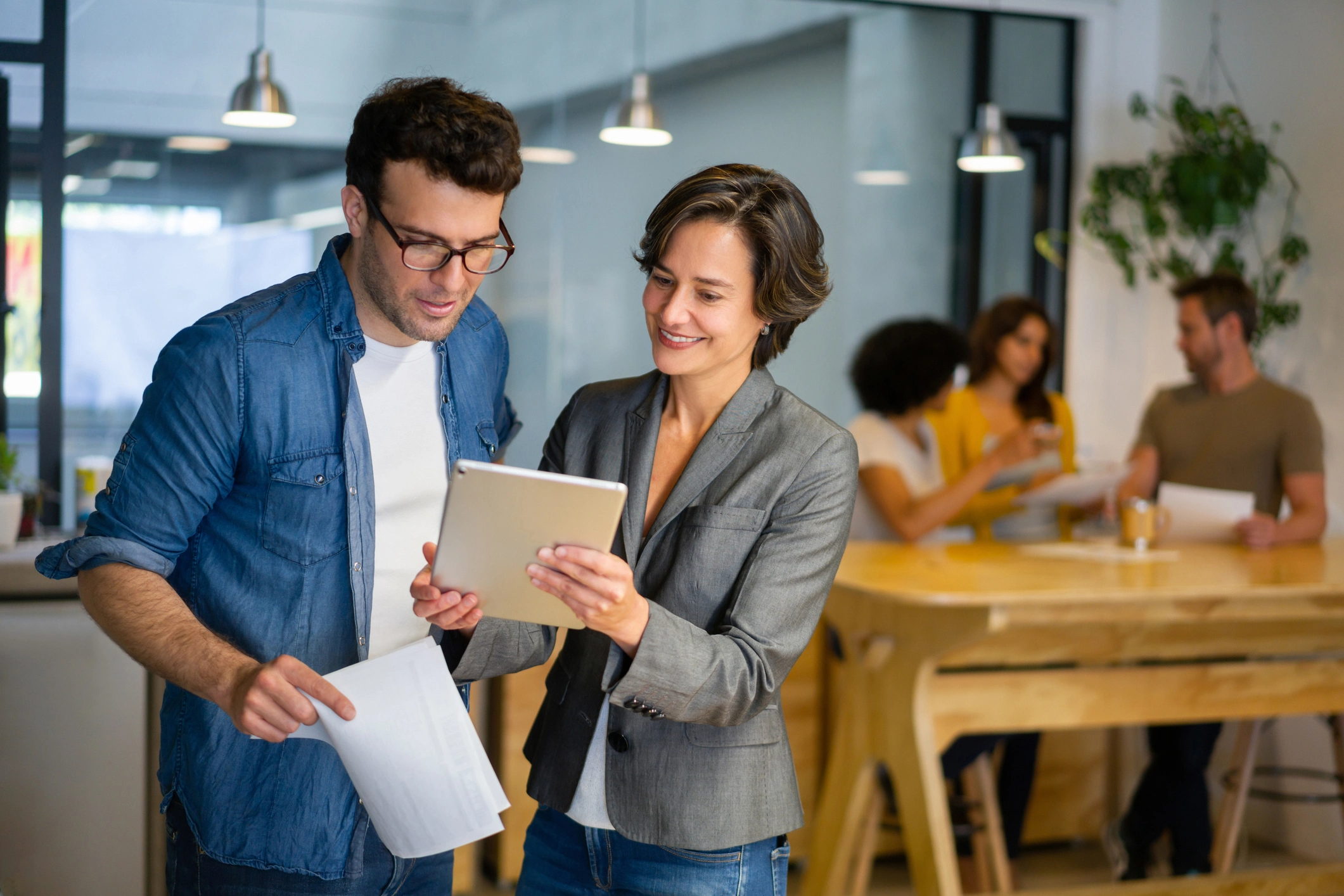 A Women and Man Discussing about Branding Strategies for Small Businesses