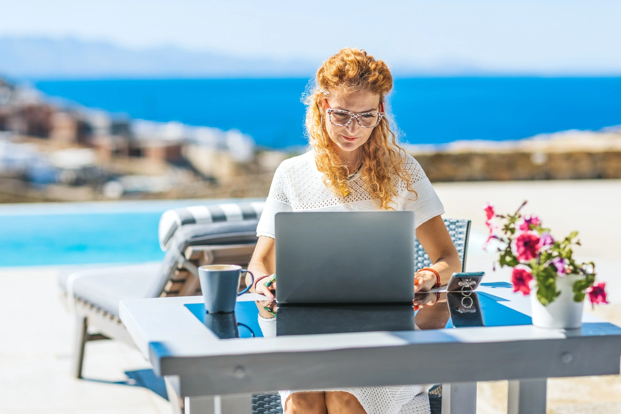 A women is using the applications on a Laptop