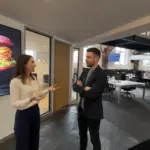 Jessica and Adam discussing ecommerce review strategy inside a UK office.
